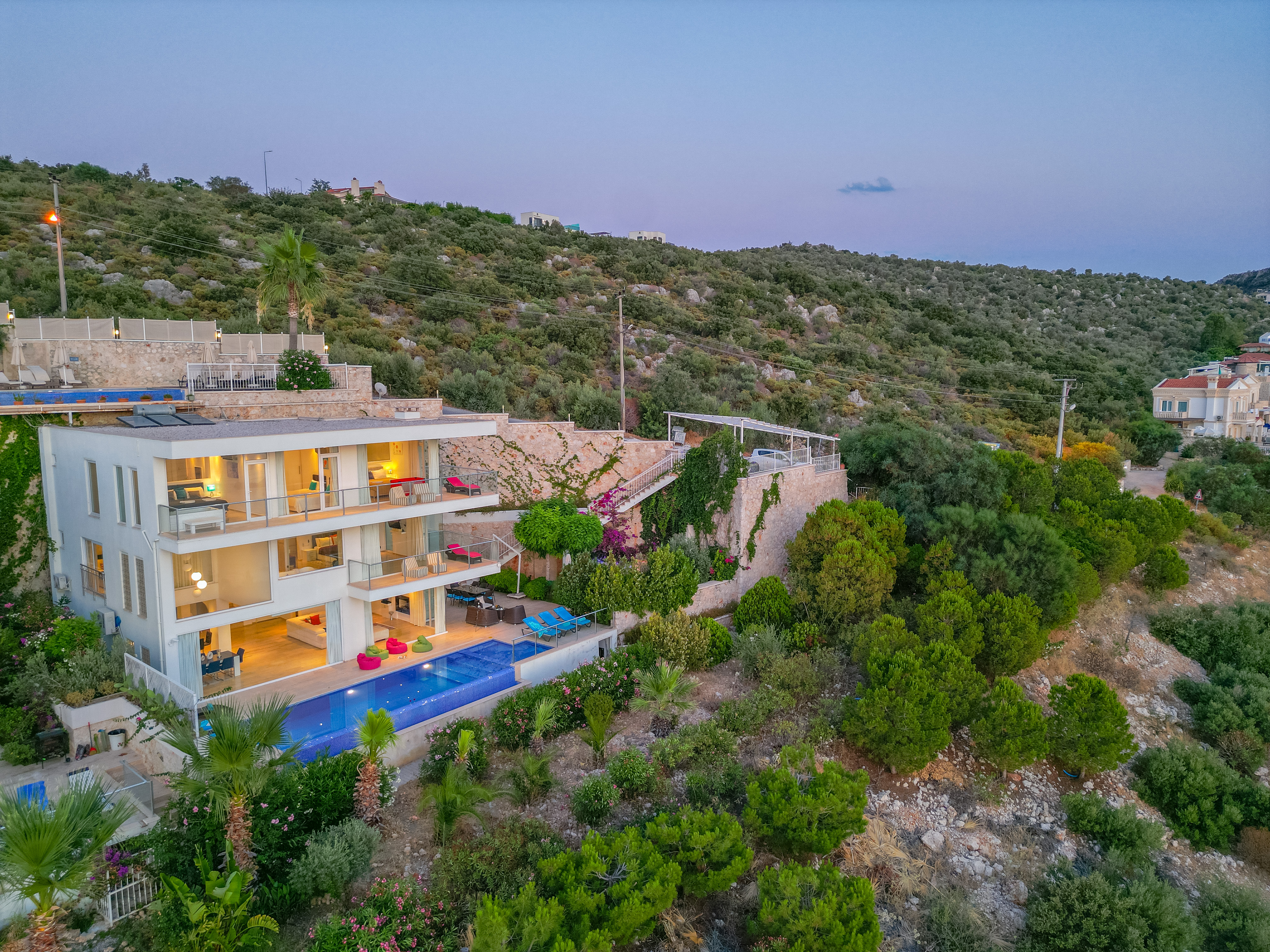 An elevated view over the villa and pool.